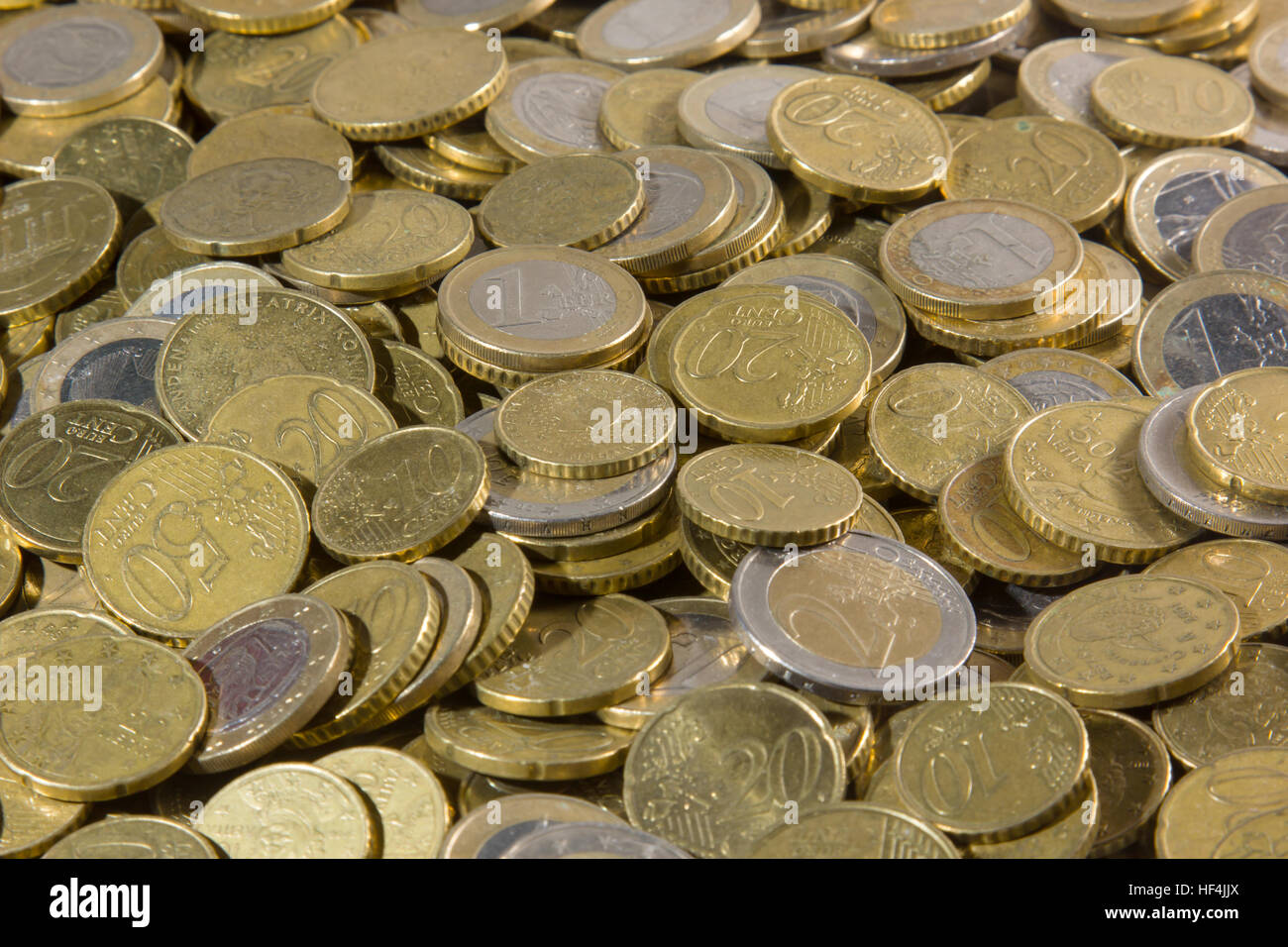 heap of euros coins isolated on a white background Stock Photo - Alamy