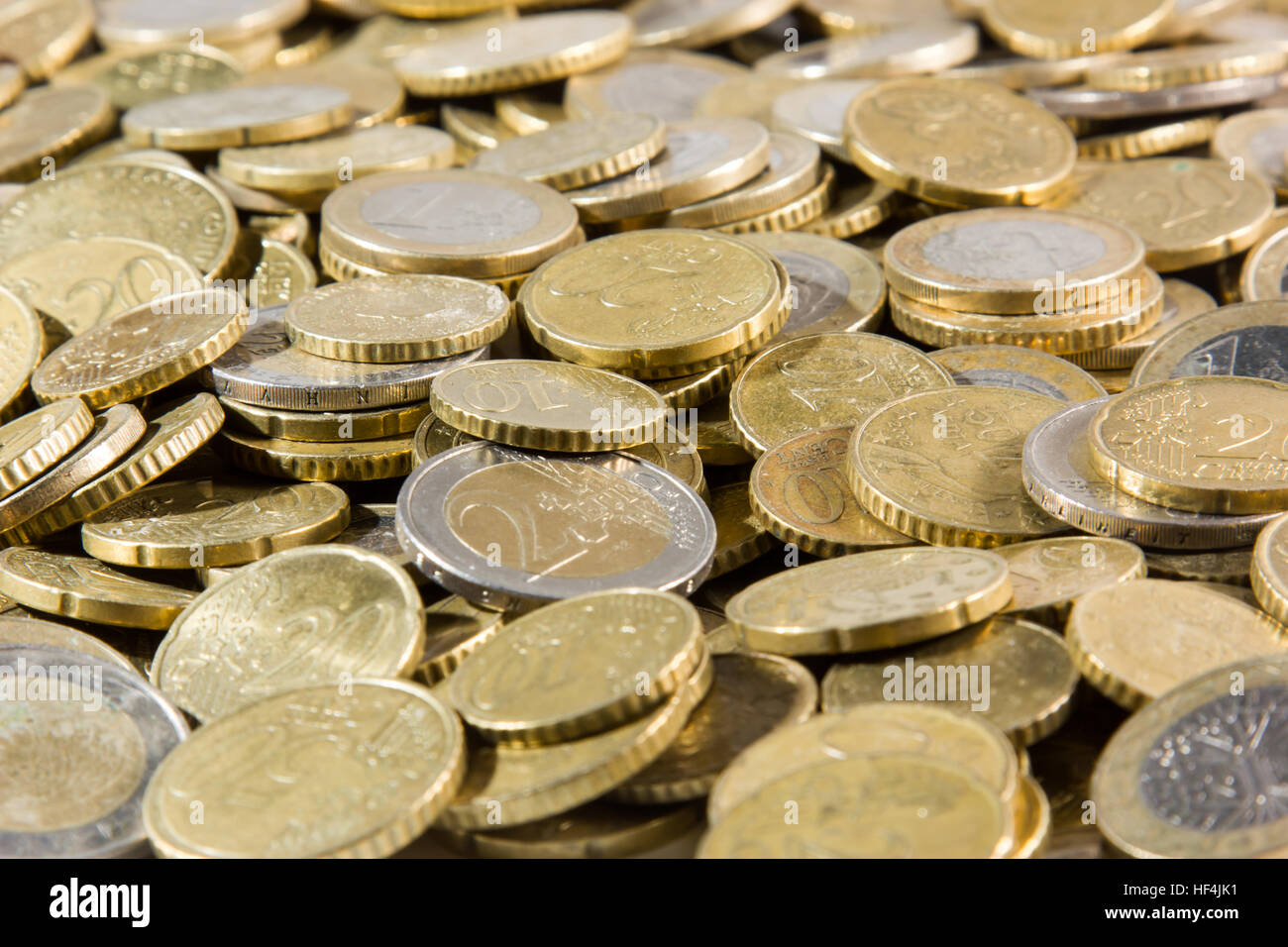 heap of euros coins isolated on a white background Stock Photo - Alamy