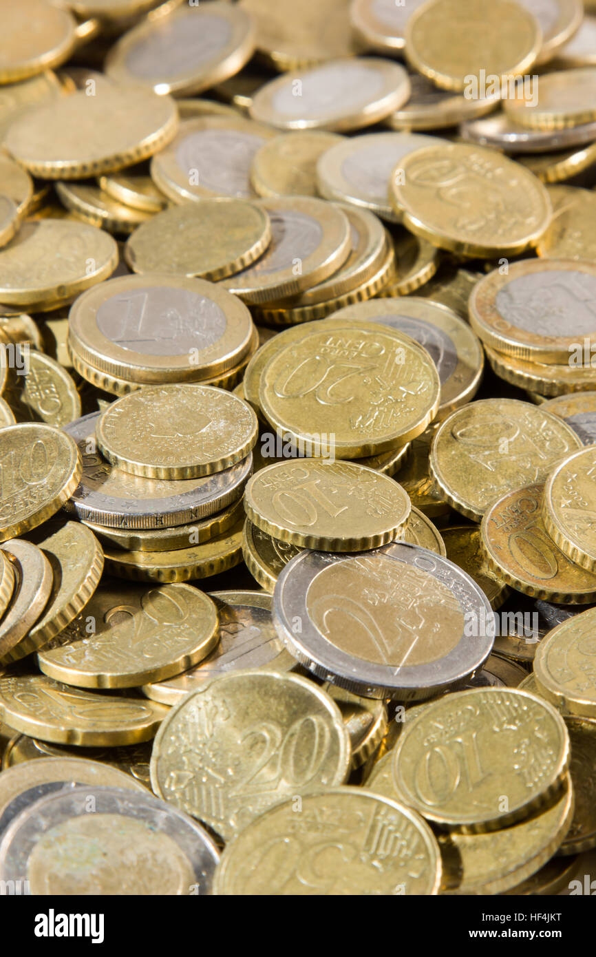 heap of euros coins isolated on a white background Stock Photo - Alamy