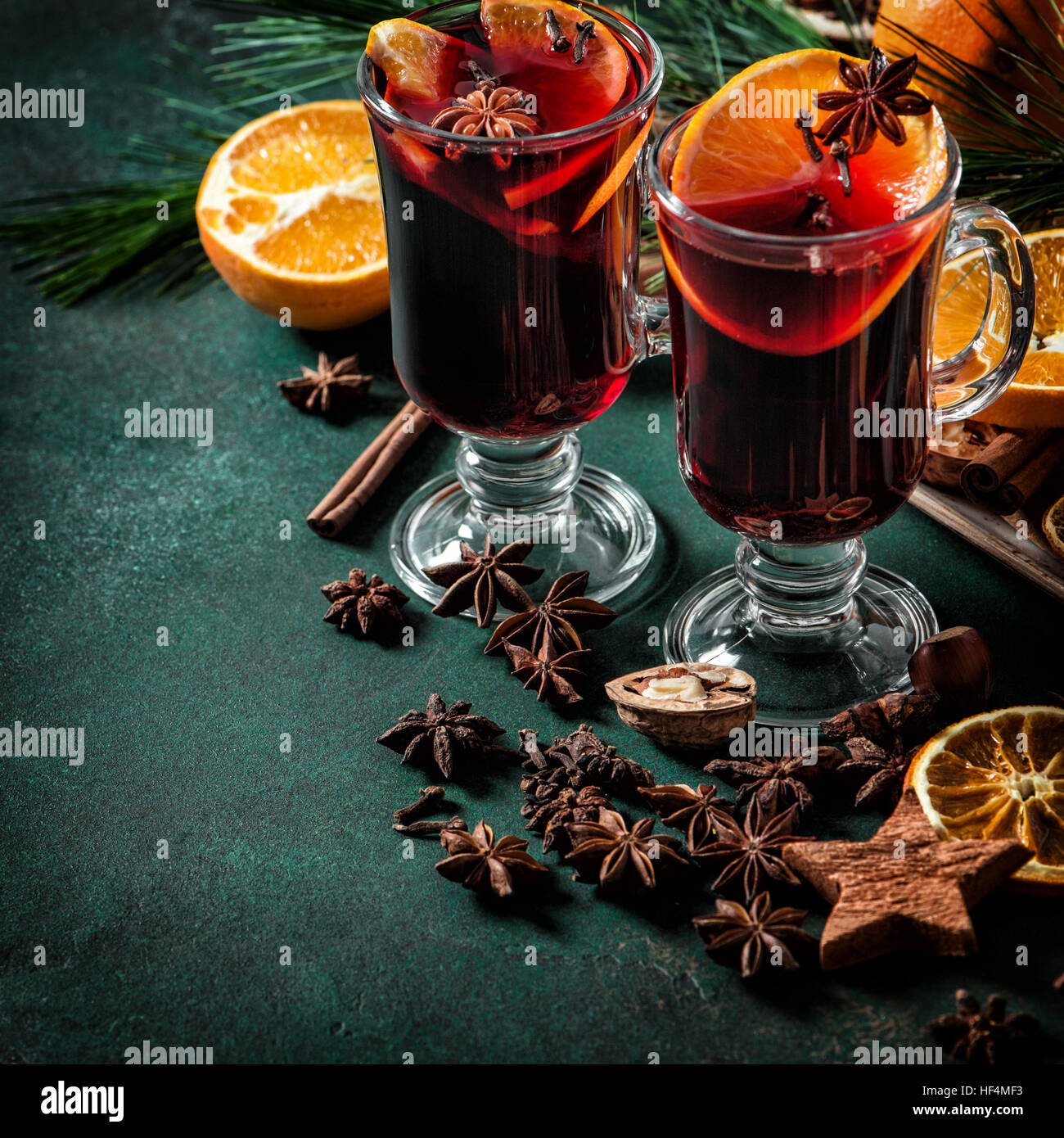 Mulled wine ingredients on dark background. Hot red punch. Christmas ...