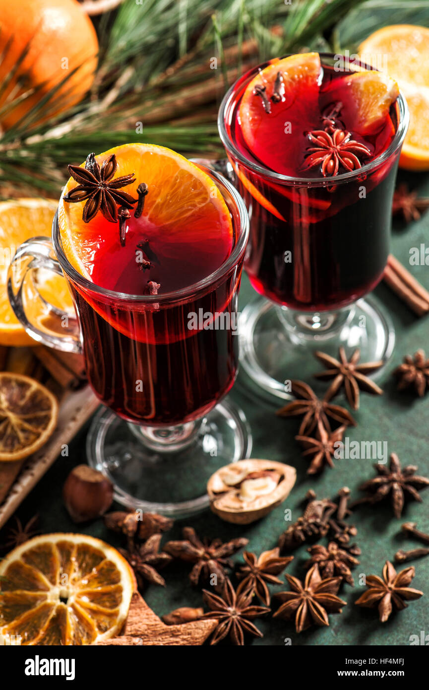 Mulled wine ingredients on dark background. Hot red winter punch with ...