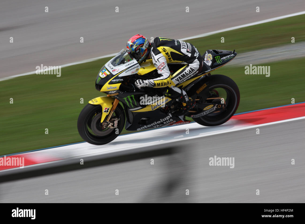 Moto GP rider during the race in Sepang International Circuits Stock Photo  - Alamy