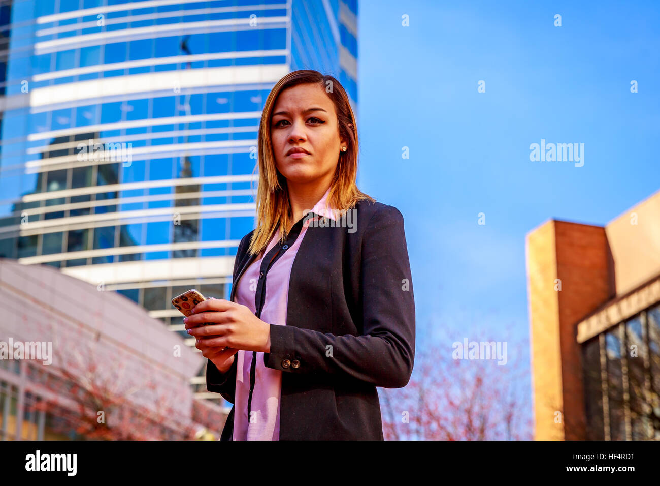 Modern portrait of a young professional business woman. Stock Photo