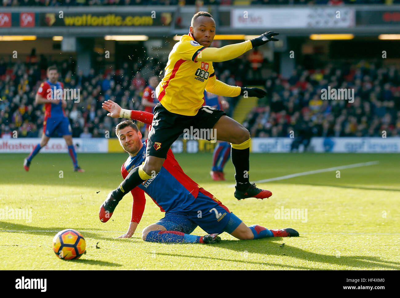 Crystal Palace's Joel Ward (left) and Watford's Juan Camilo Zuniga (right) battle for the ball during the Premier League match at Vicarage Road, Watford. Stock Photo