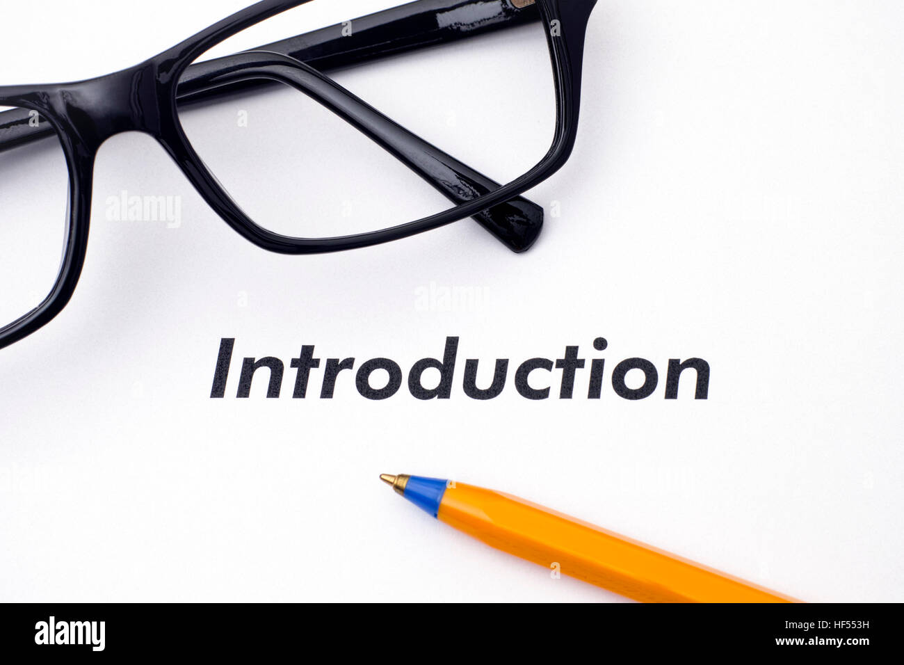 Page with word Introduction and glasses and ballpoint pen Stock Photo ...