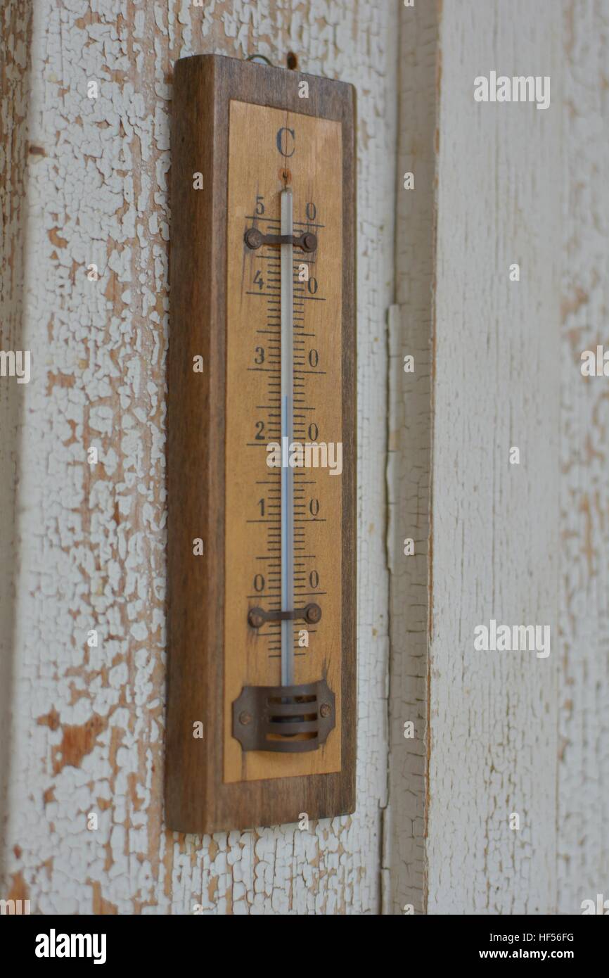 Wooden thermometer outside temperature Stock Photo by ©Egor_1896 247566650
