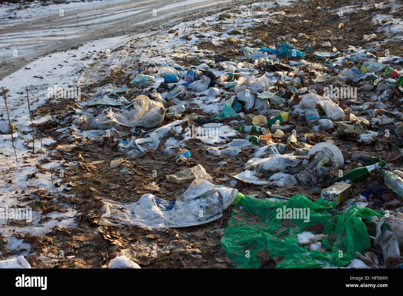 Pile of plastic bags and other refined petroleum products dumped in