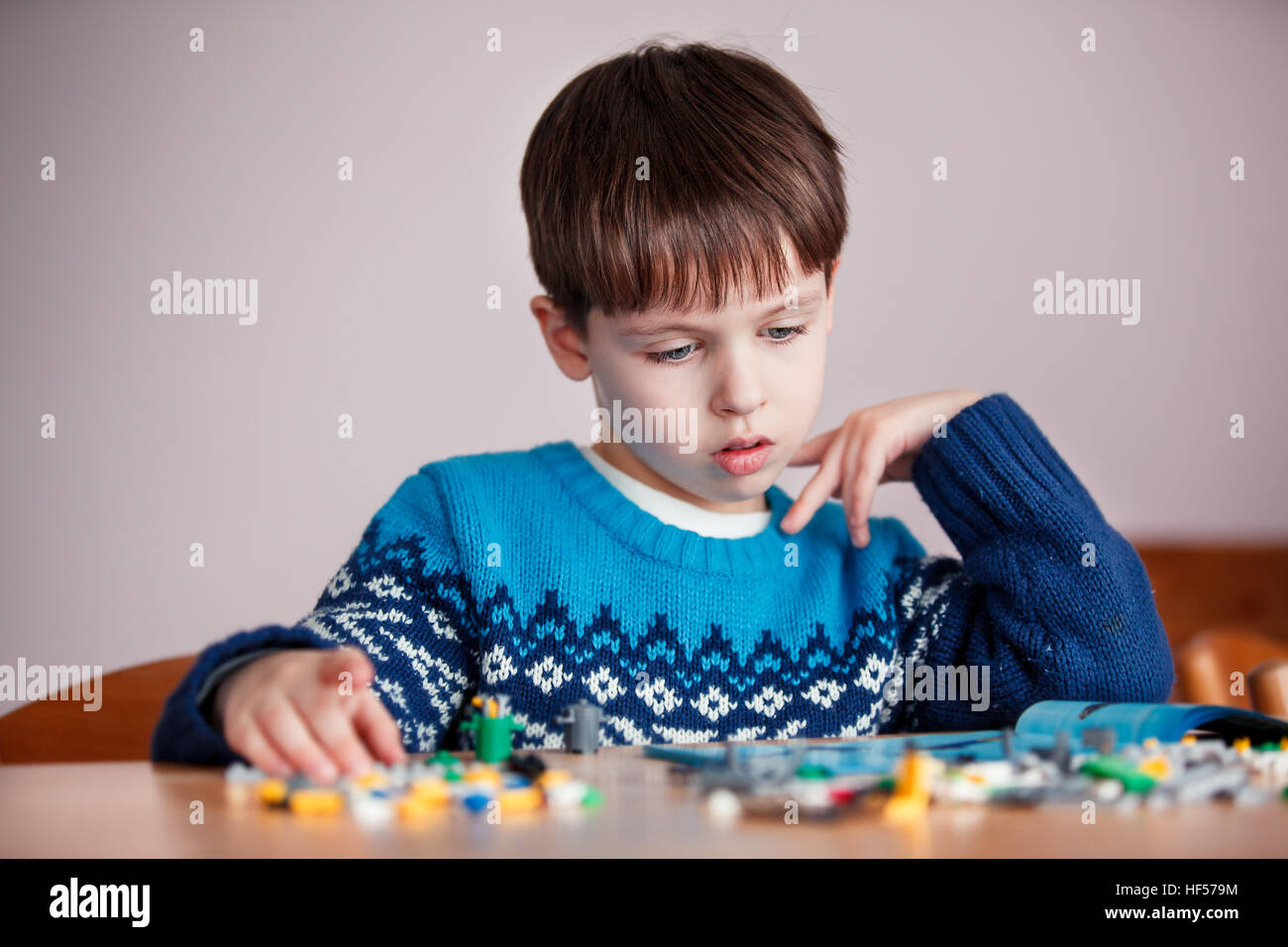 Five years old boy playing with building blocks Stock Photo Alamy