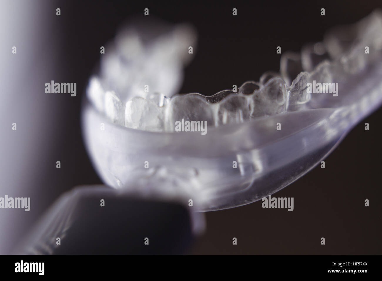 Vibrating dental device with invisible orthodontics Stock Photo Alamy