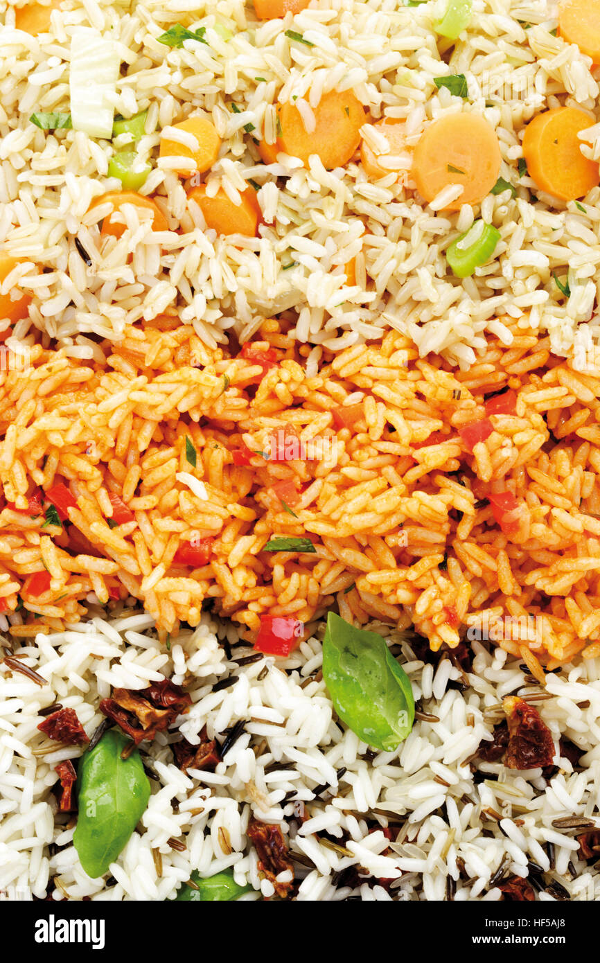 Rice varieties - long grain rice, Djuvec rice, vegetable rice - image-filling Stock Photo