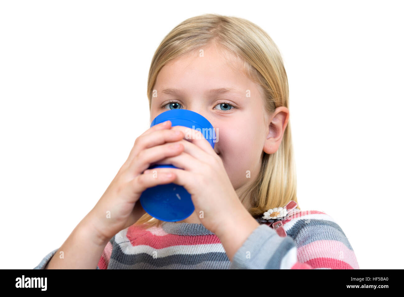 girl drinking bottle of milk laying on bed blond toddler Stock Photo - Alamy