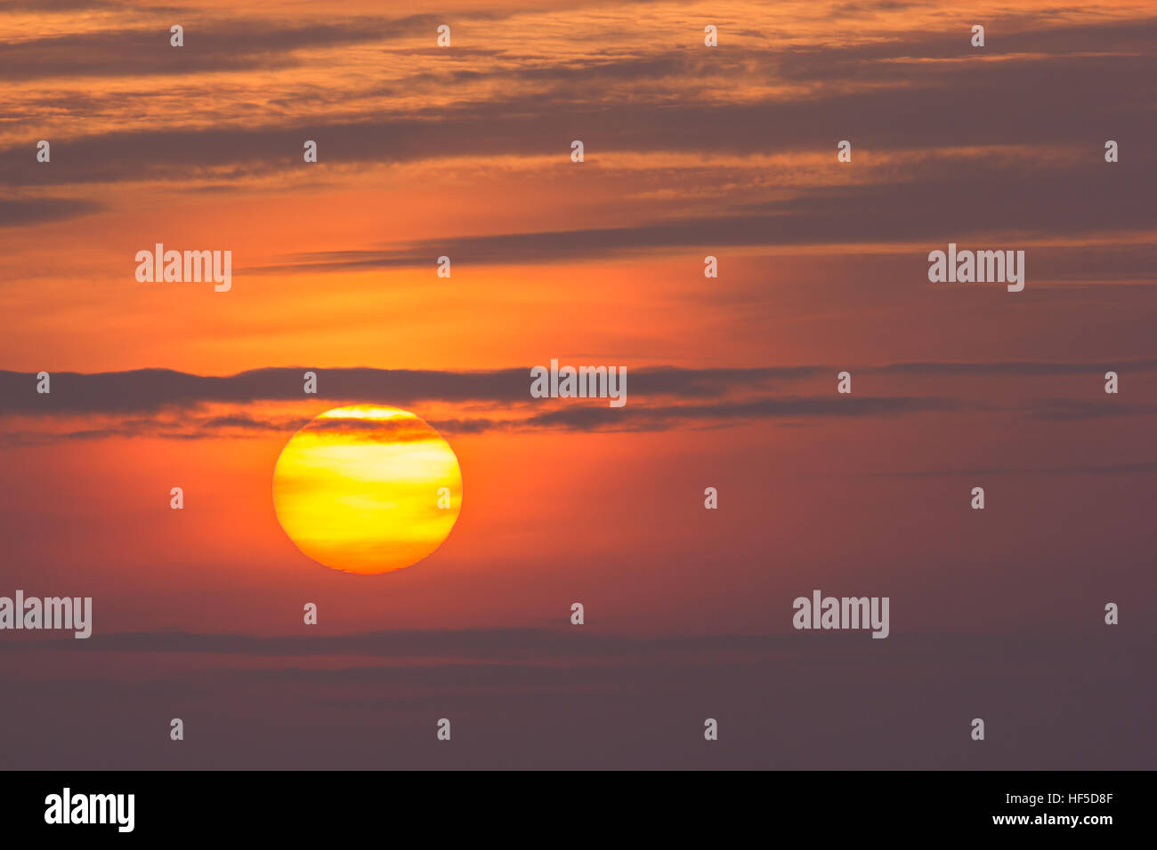 The sunset with thin layered cloud, Isles of Scilly, UK, March 2015 Stock Photo