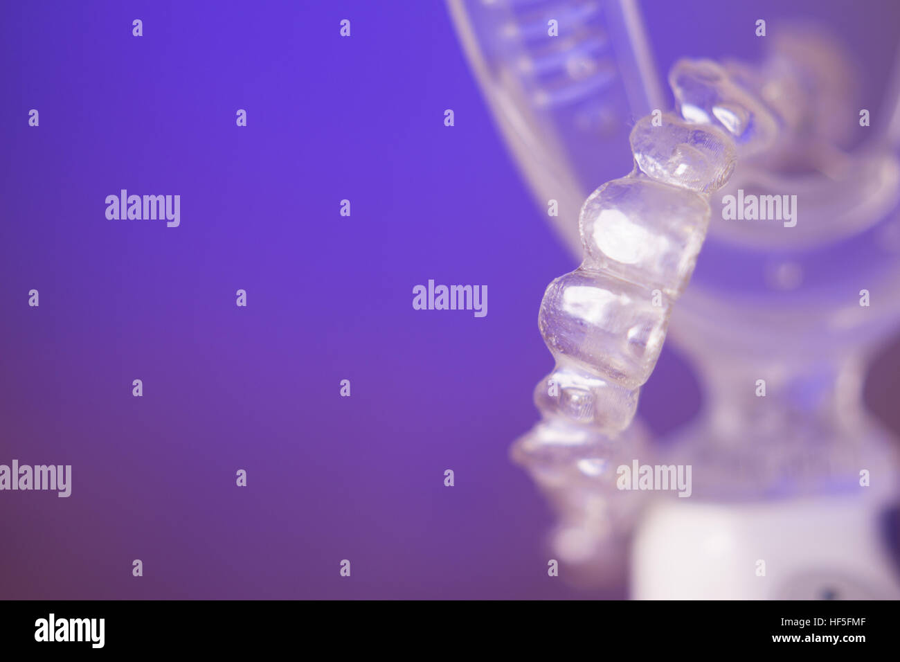 Vibrating dental device with invisible orthodontics Stock Photo Alamy