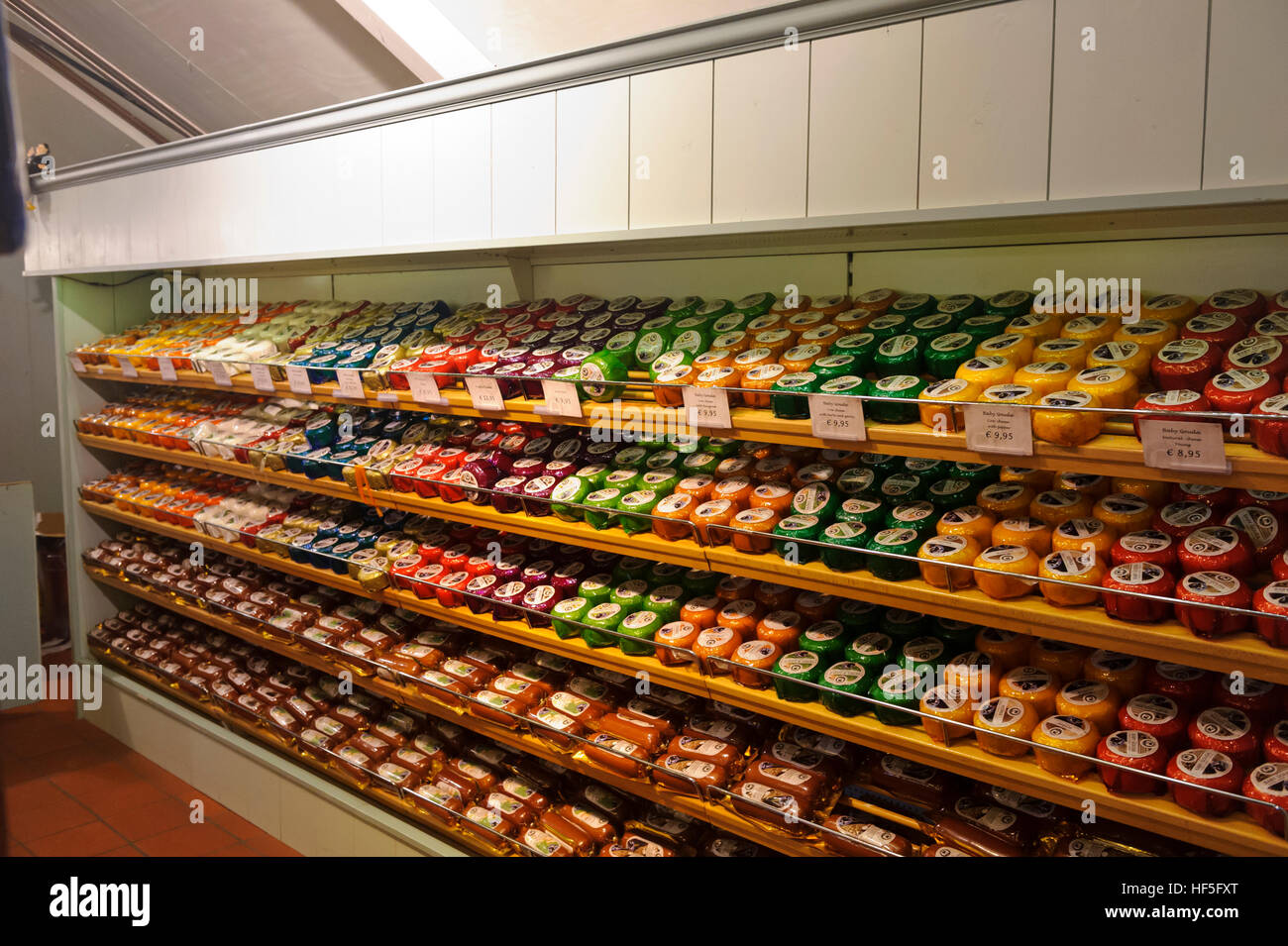 A large selection of Dutch cheeses on sale in a cheese factory in