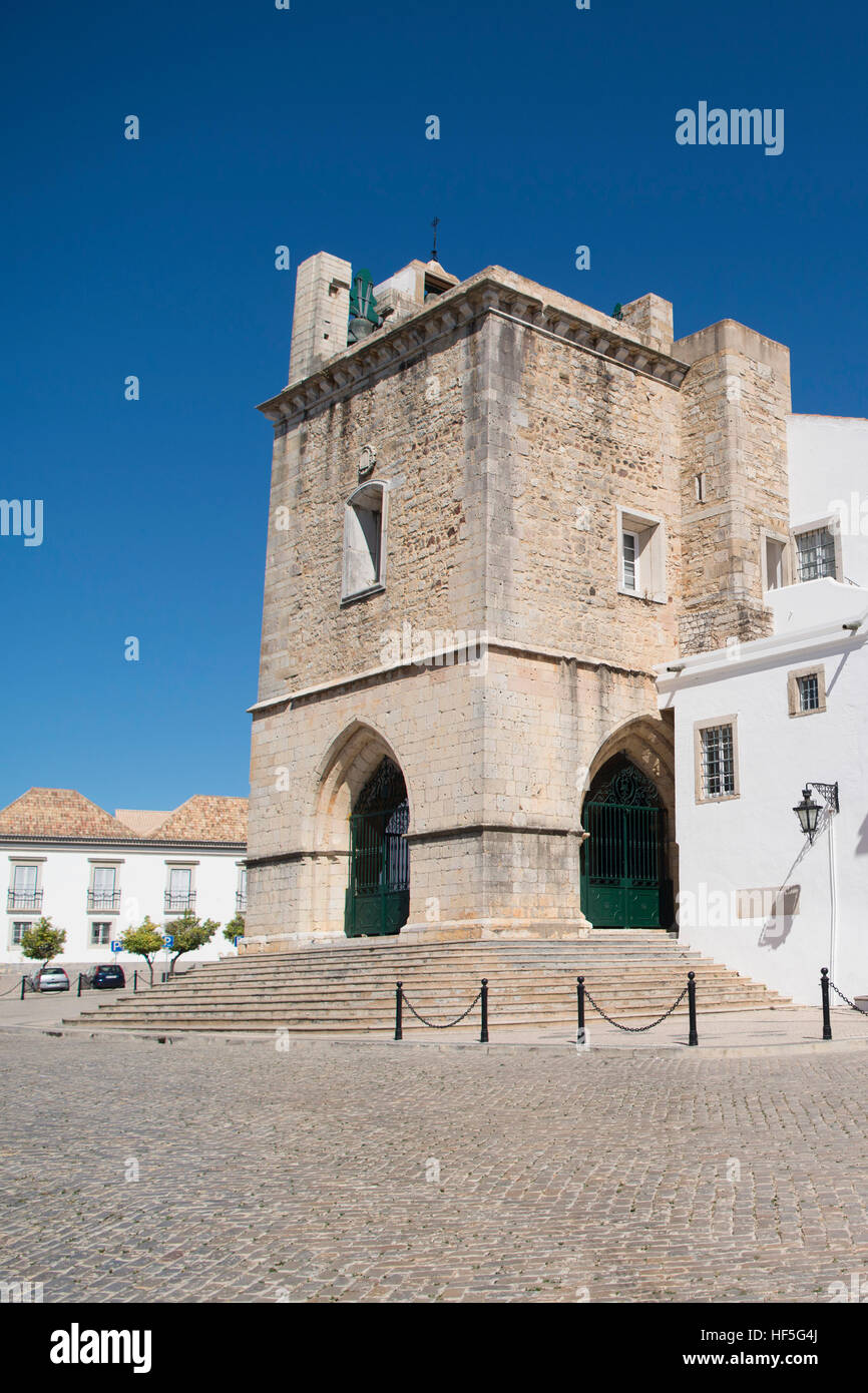 the clock tower of the Cathedral in the old town of Faro at the east Algarve in the south of Portugal in Europe. Stock Photo