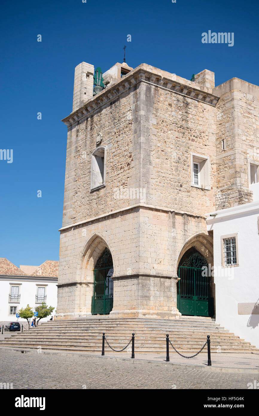 the clock tower of the Cathedral in the old town of Faro at the east Algarve in the south of Portugal in Europe. Stock Photo