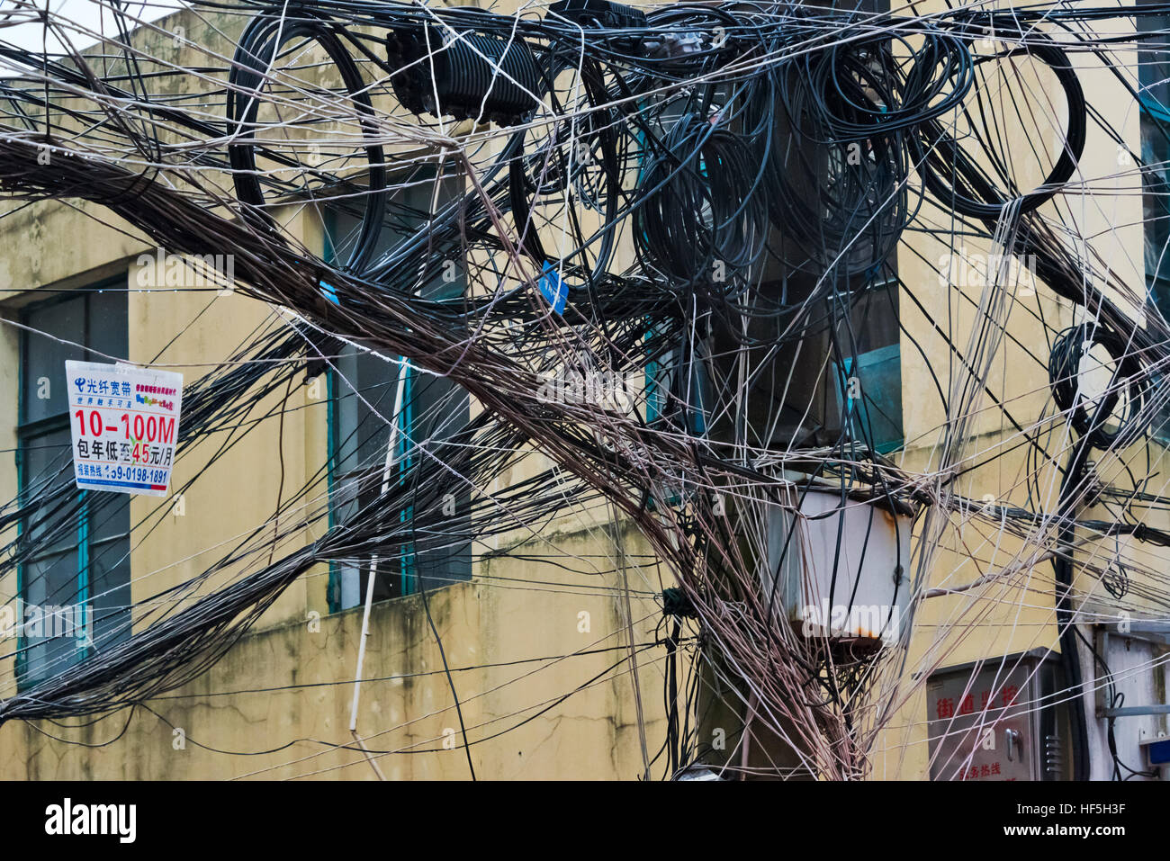 Messy wires in the old residential area, Shanghai, China Stock Photo