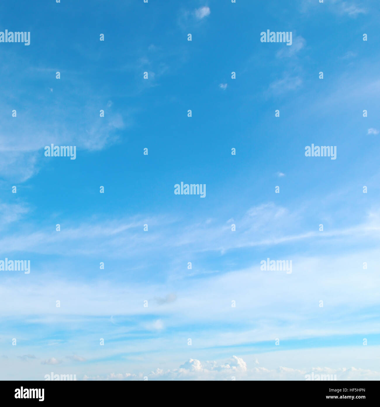 fluffy clouds in the blue sky Stock Photo - Alamy