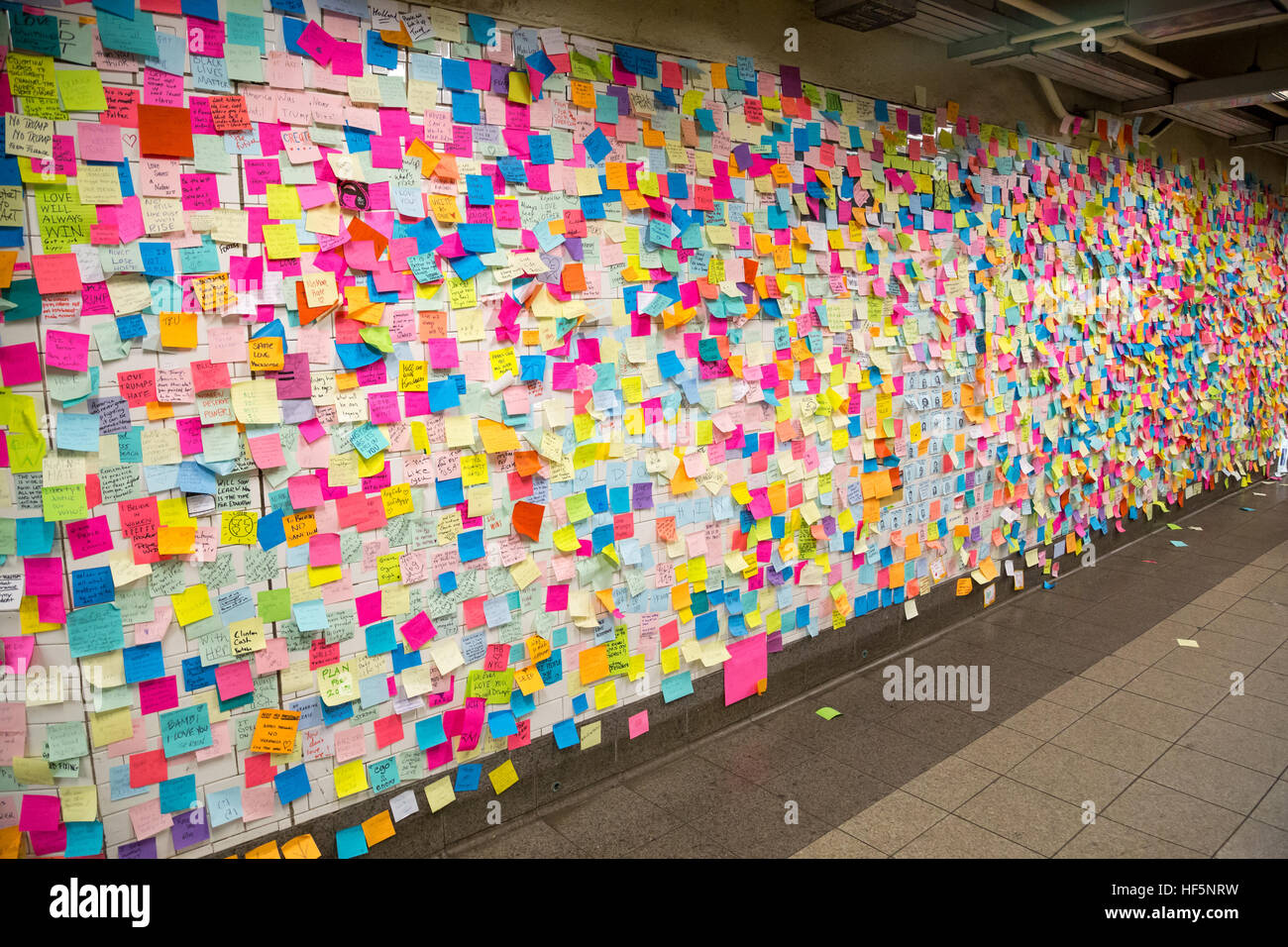 New York, United States of America - November 21, 2016: Sticky post-it notes on wall in Union Square subway station Stock Photo