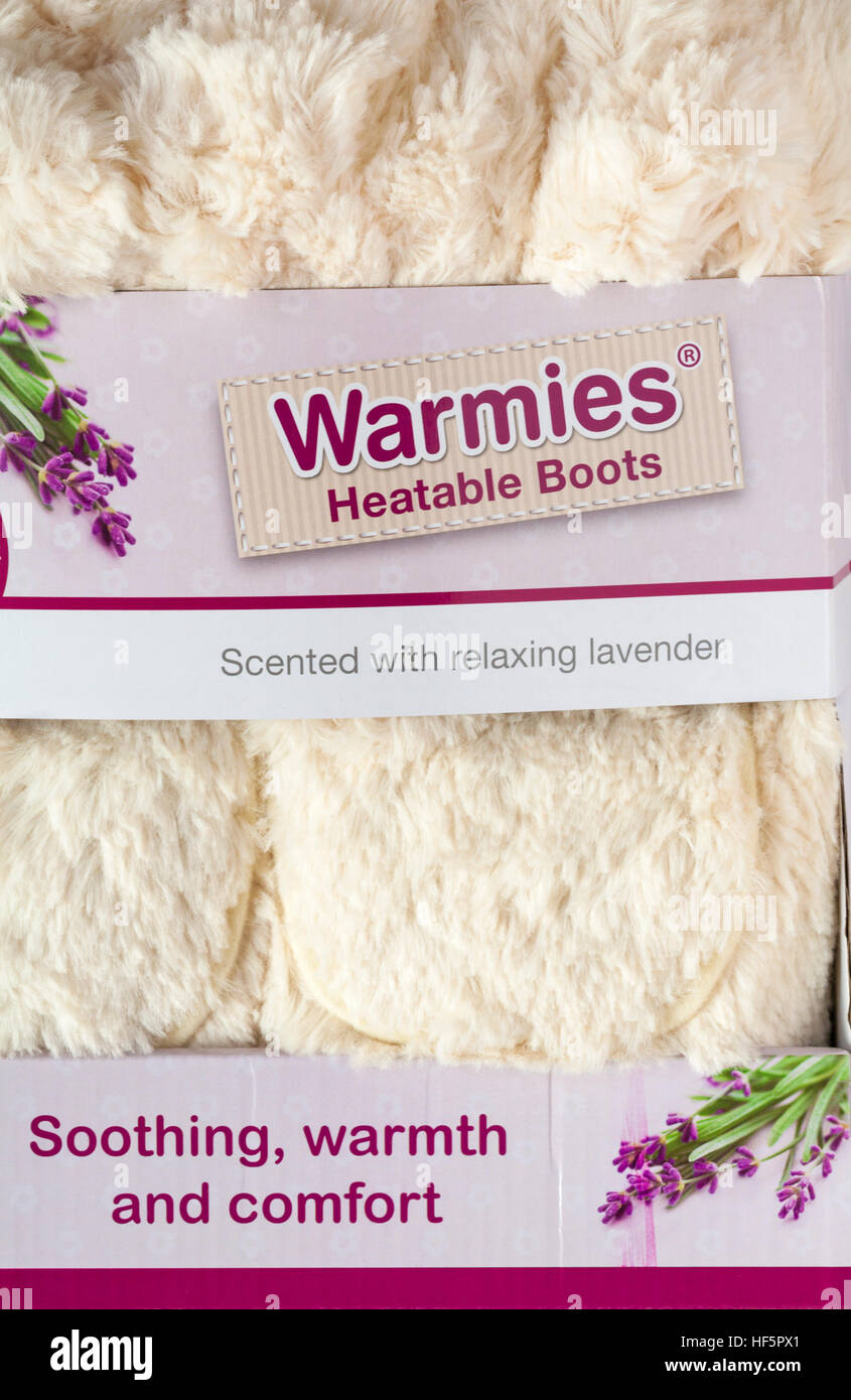 Pair of Warmies Heatable Boots soothing warmth and comfort scented with relaxing lavender - warm in a microwave for 90 seconds Stock Photo