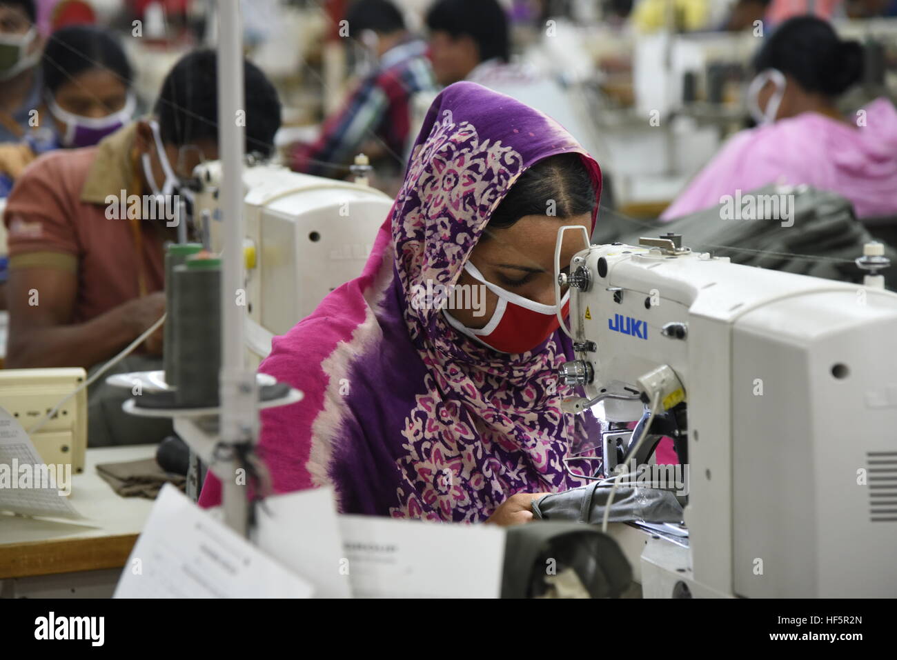 Bangladesh labors works in a Ready made garment (RMG) factory in Ashulia near Dhaka, Bangladesh Stock Photo