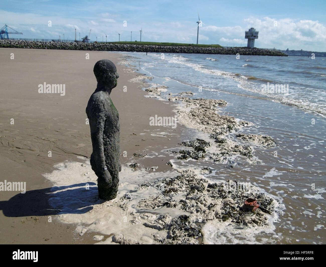 Anthony Gormley statues crosby liverpool figure beach wind farm sea