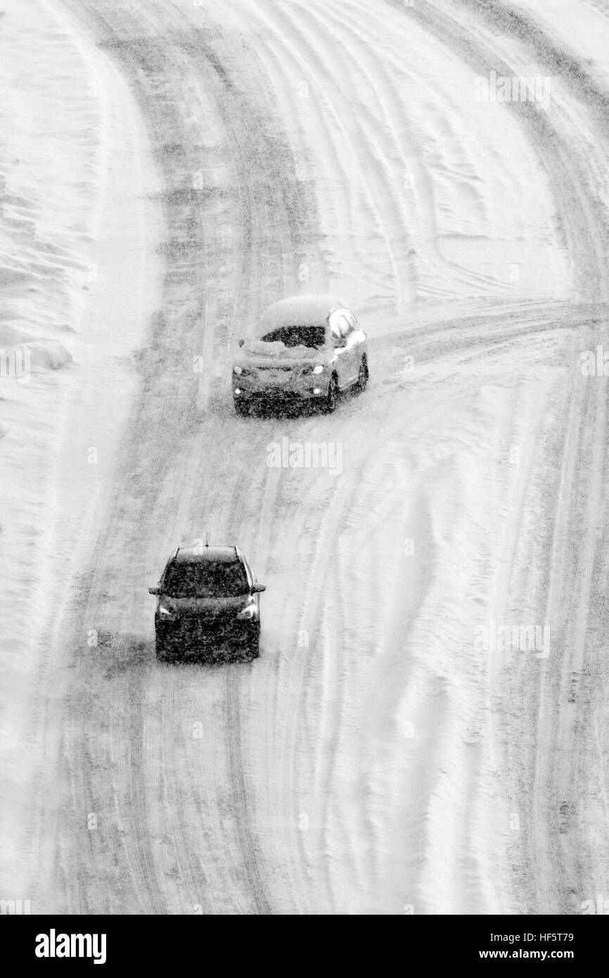 Driving on snow and snowy roads in winter traffic lights blizzard Stock ...