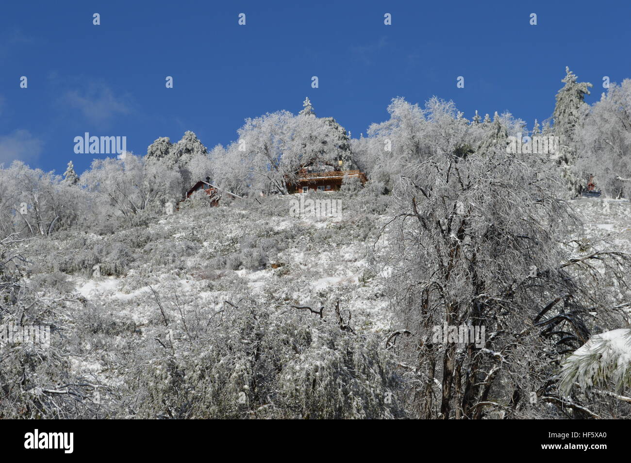 House on Snowy Mountain Stock Photo