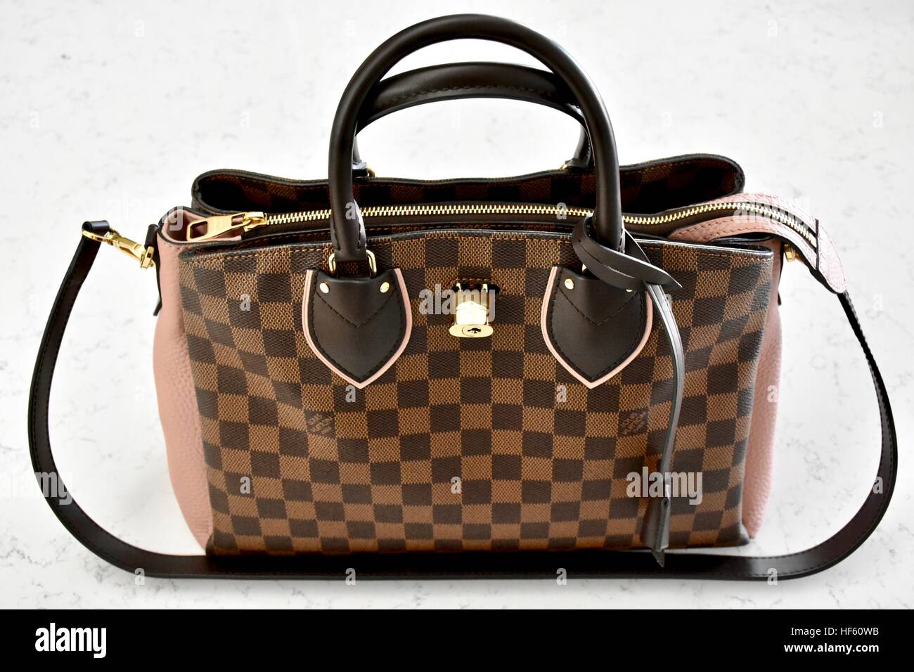 Louis vuitton bag woman hi-res stock photography and images - Alamy