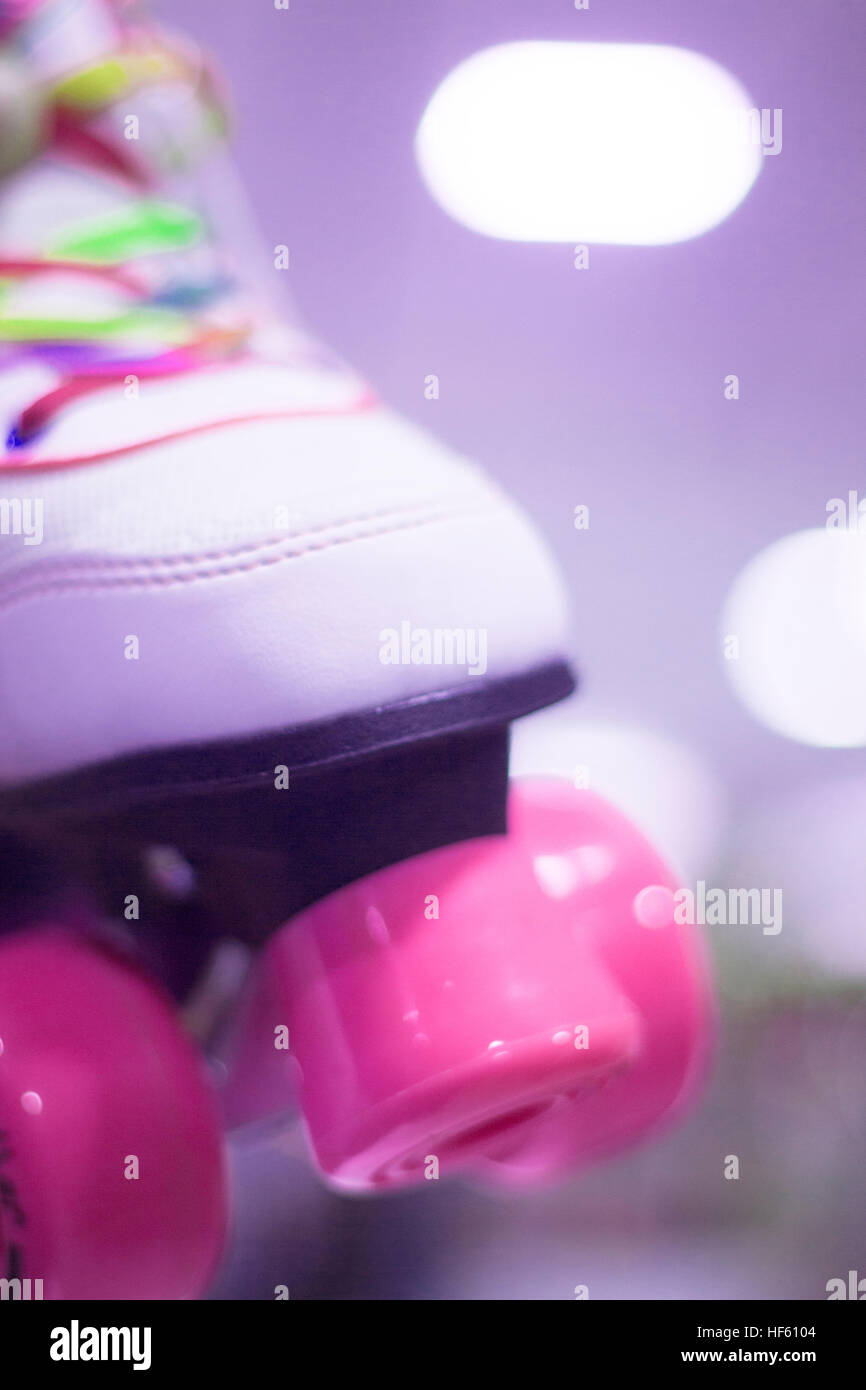 Childrens quad skate rollerskates in skate store in shop window display