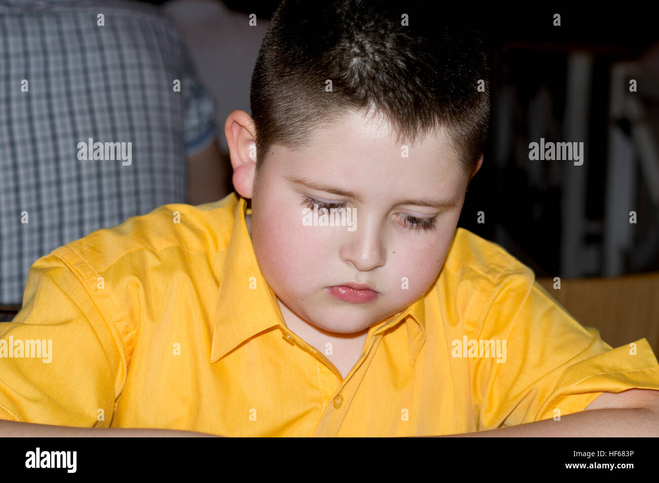 portrait of the sad boy in cafe Stock Photo Alamy