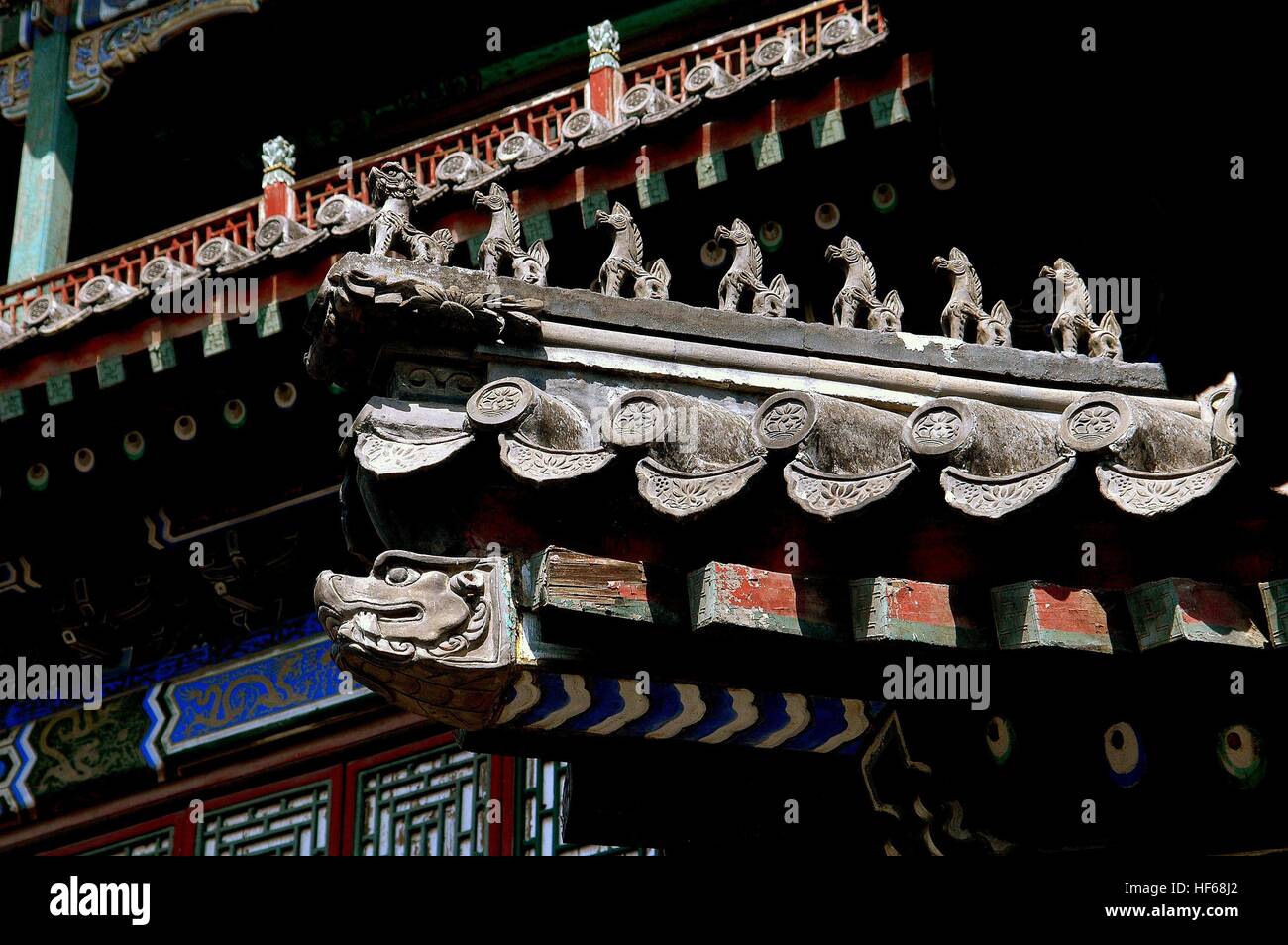 Beijing, China:  Flying eave roofs with carved dragons at1891 Garden of Virtue and Harmony at the Summer  Palace Stock Photo