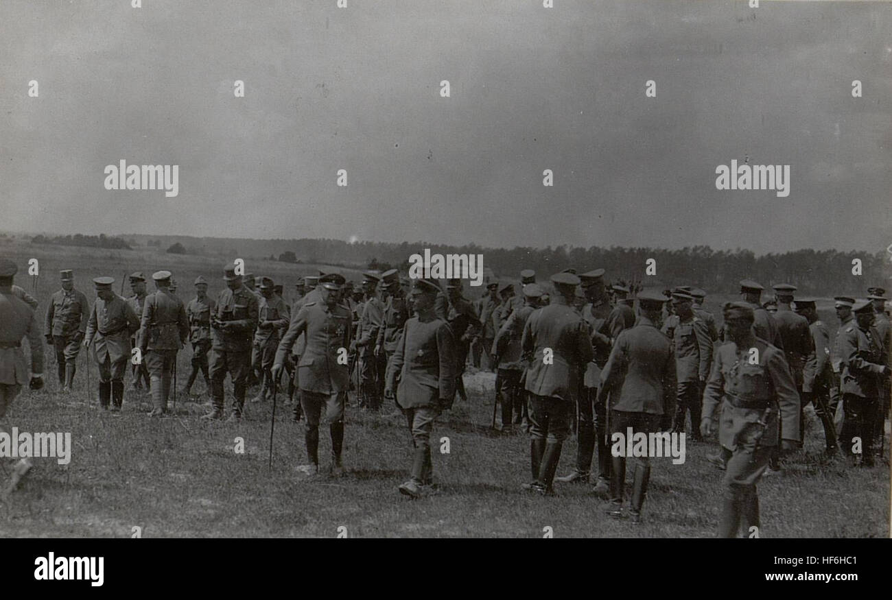 Group of spectators watching a storm course (military exercise) during ...