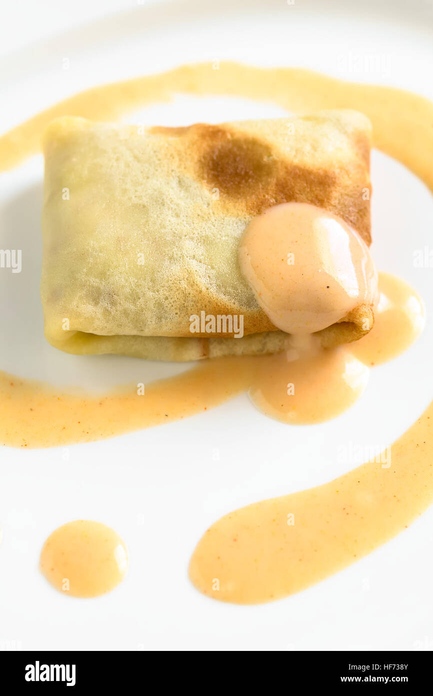 Hungarian Hortobagyi Palacsinta or Crepe a la Hortobagy, a savory thin