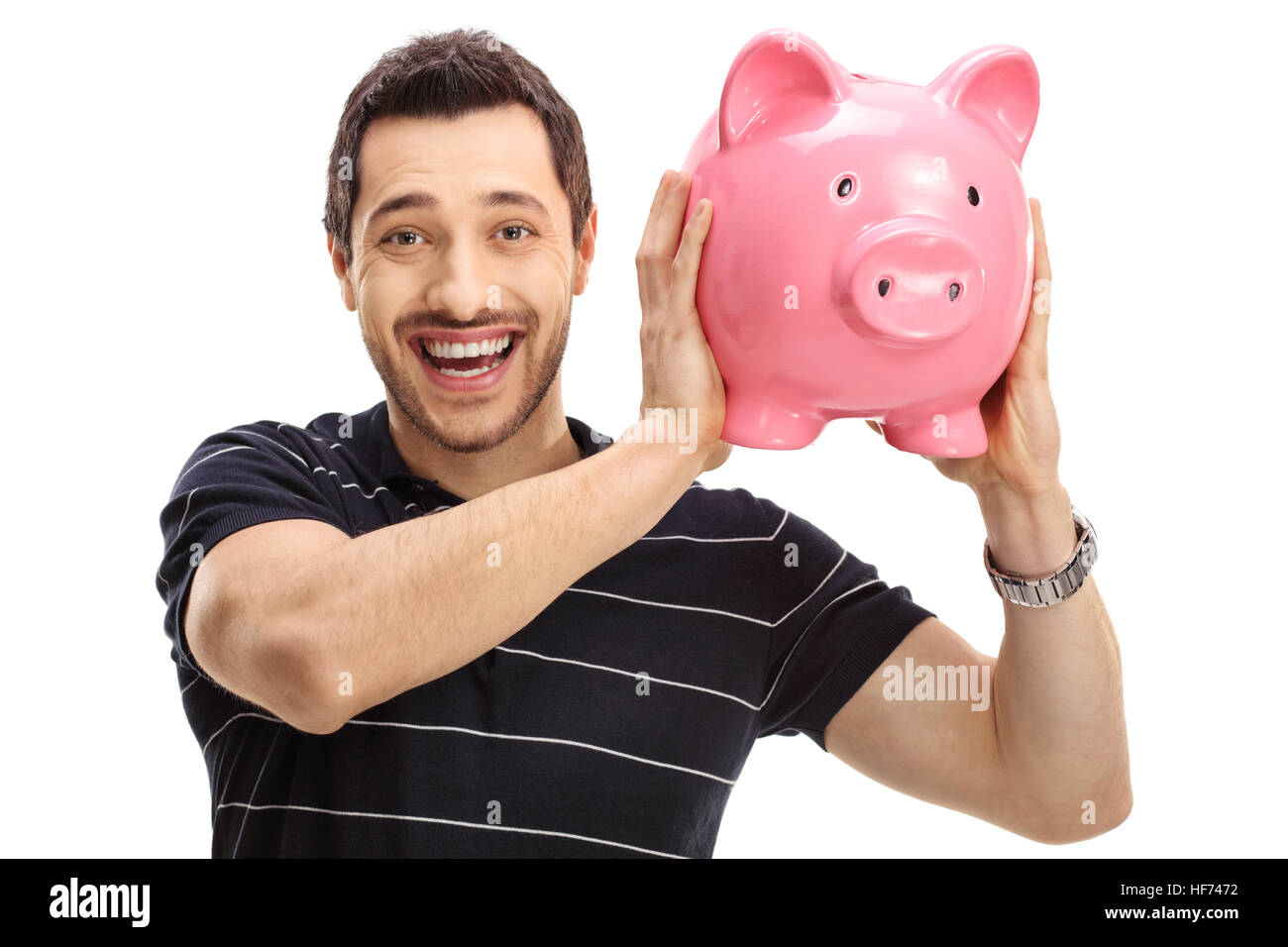 Joyful man with a piggybank isolated on white background Stock Photo ...