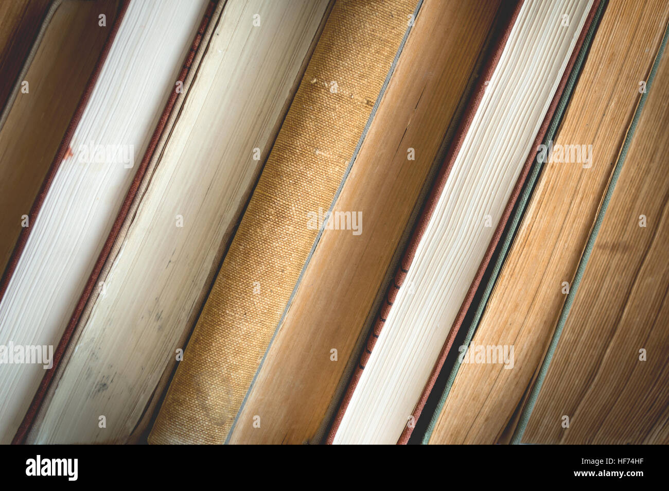 Close-up of old books. Image performed in vintage stylization. Stock Photo