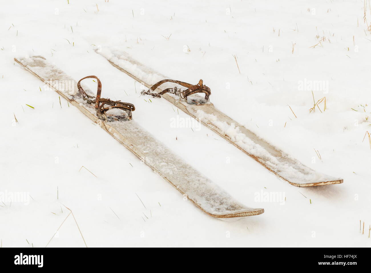 Pair of old skis on the snow Stock Photo Alamy