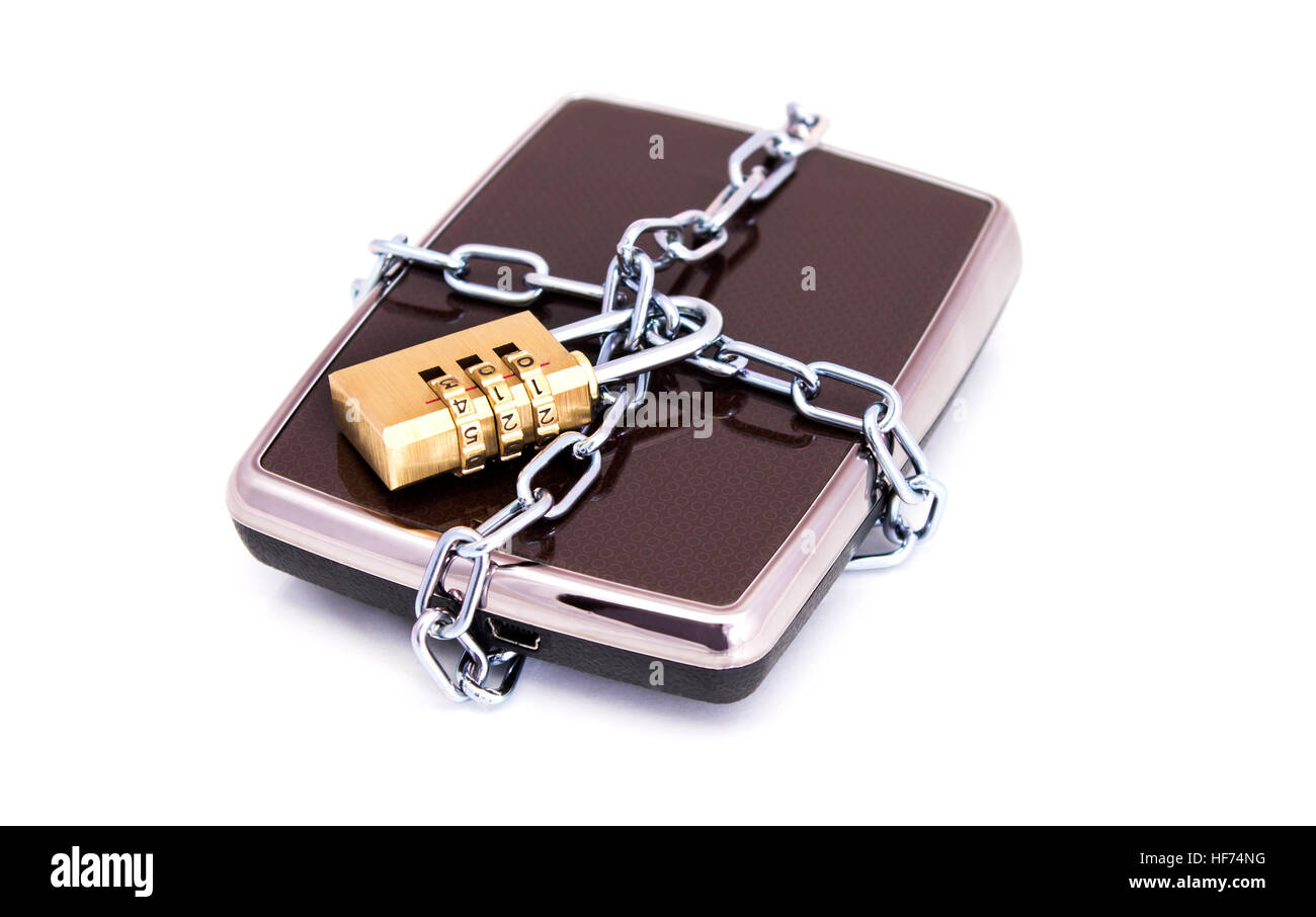 Portable hard drive disk and combination lock padlock. Data security concept Stock Photo