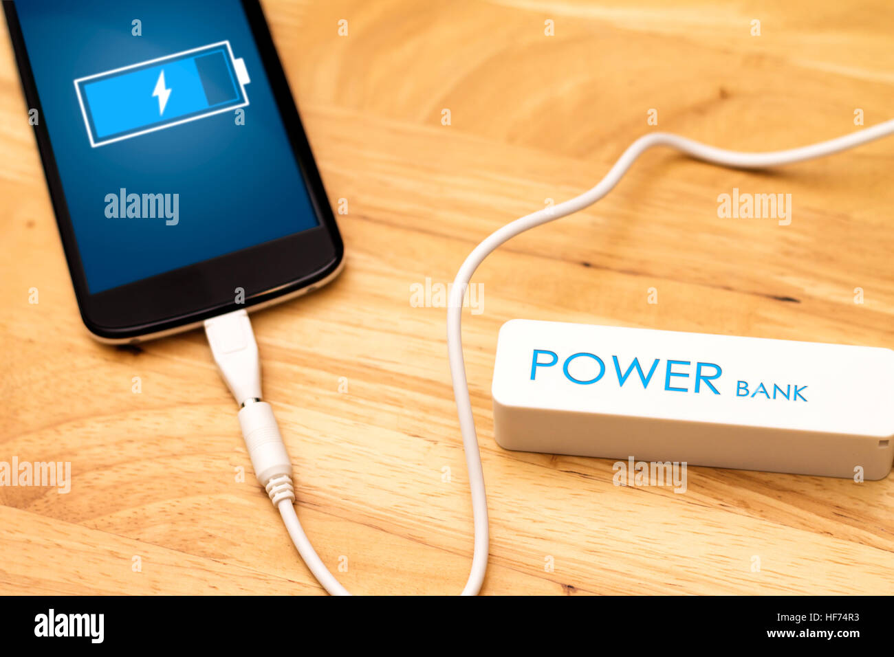 Phone charging with energy bank Stock Photo Alamy