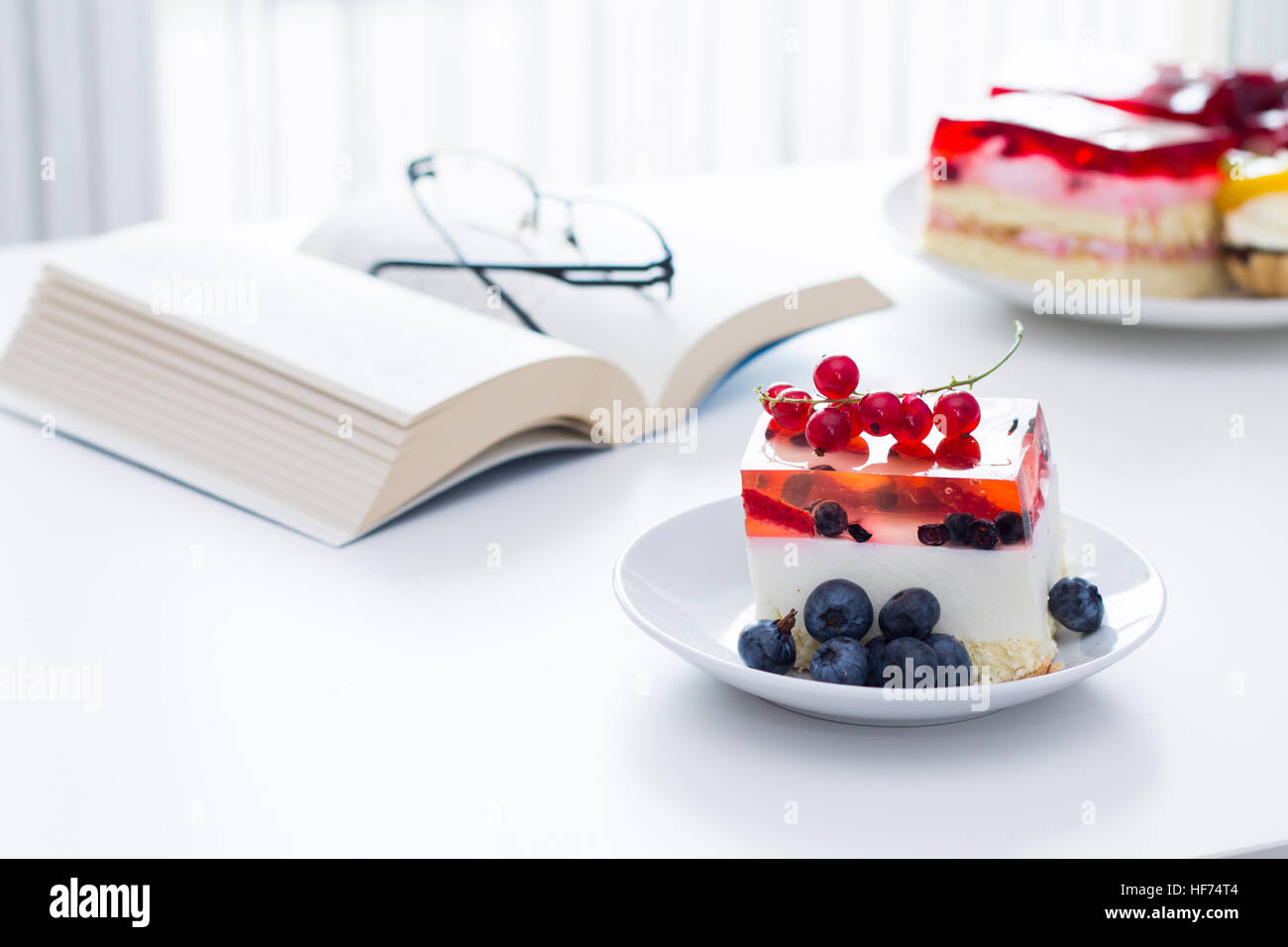 Time for something sweet. Cake with jelly on the table. Stock Photo