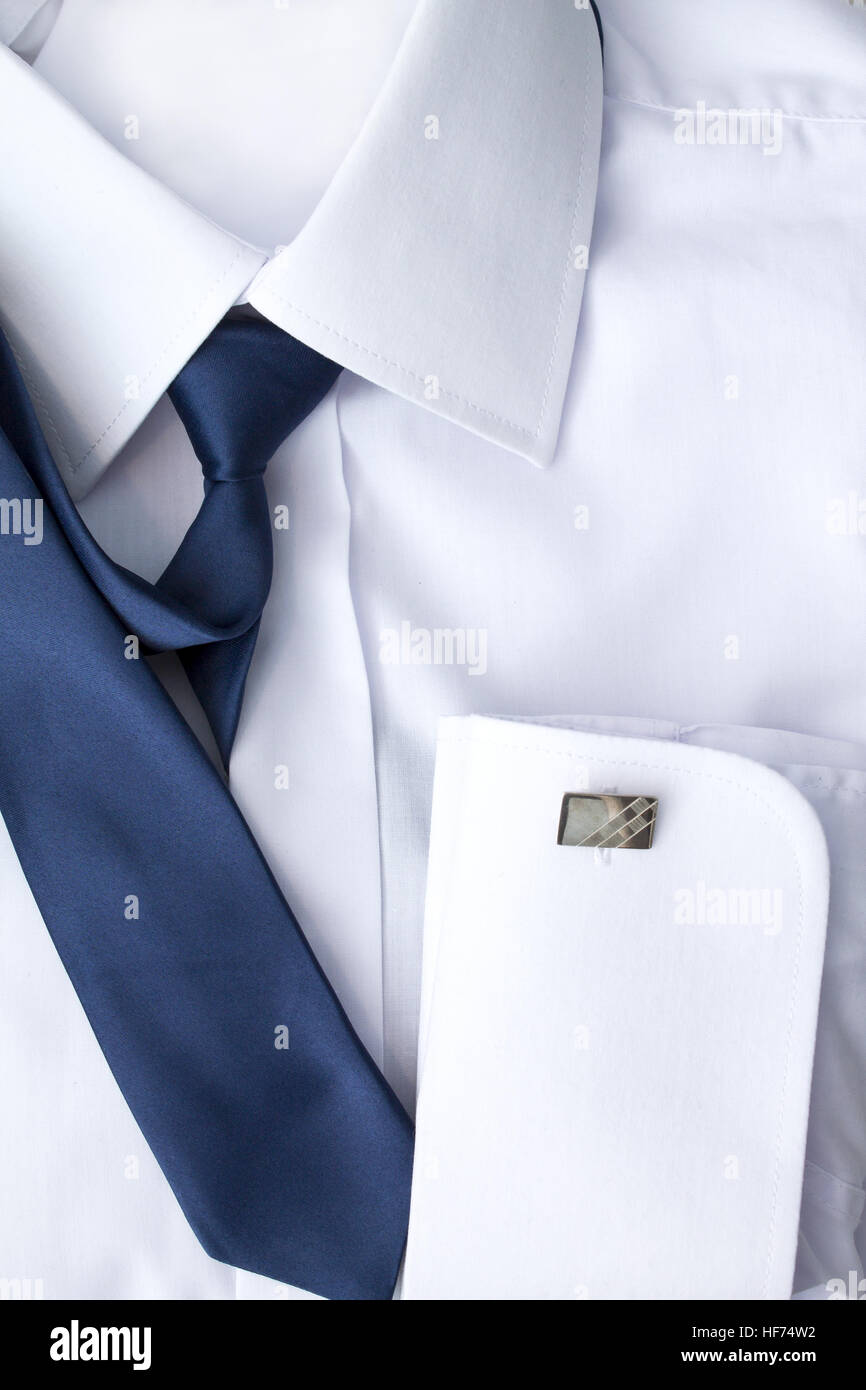 Man's white shirt with blue tie and cufflinks Stock Photo