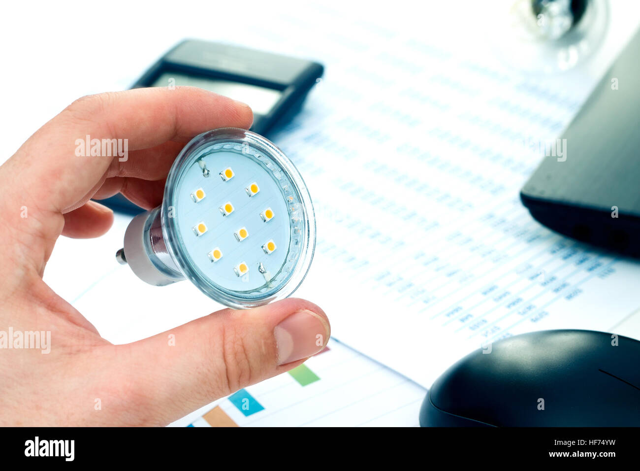 Man thinking about saving money. New solutions in energy saving Stock Photo