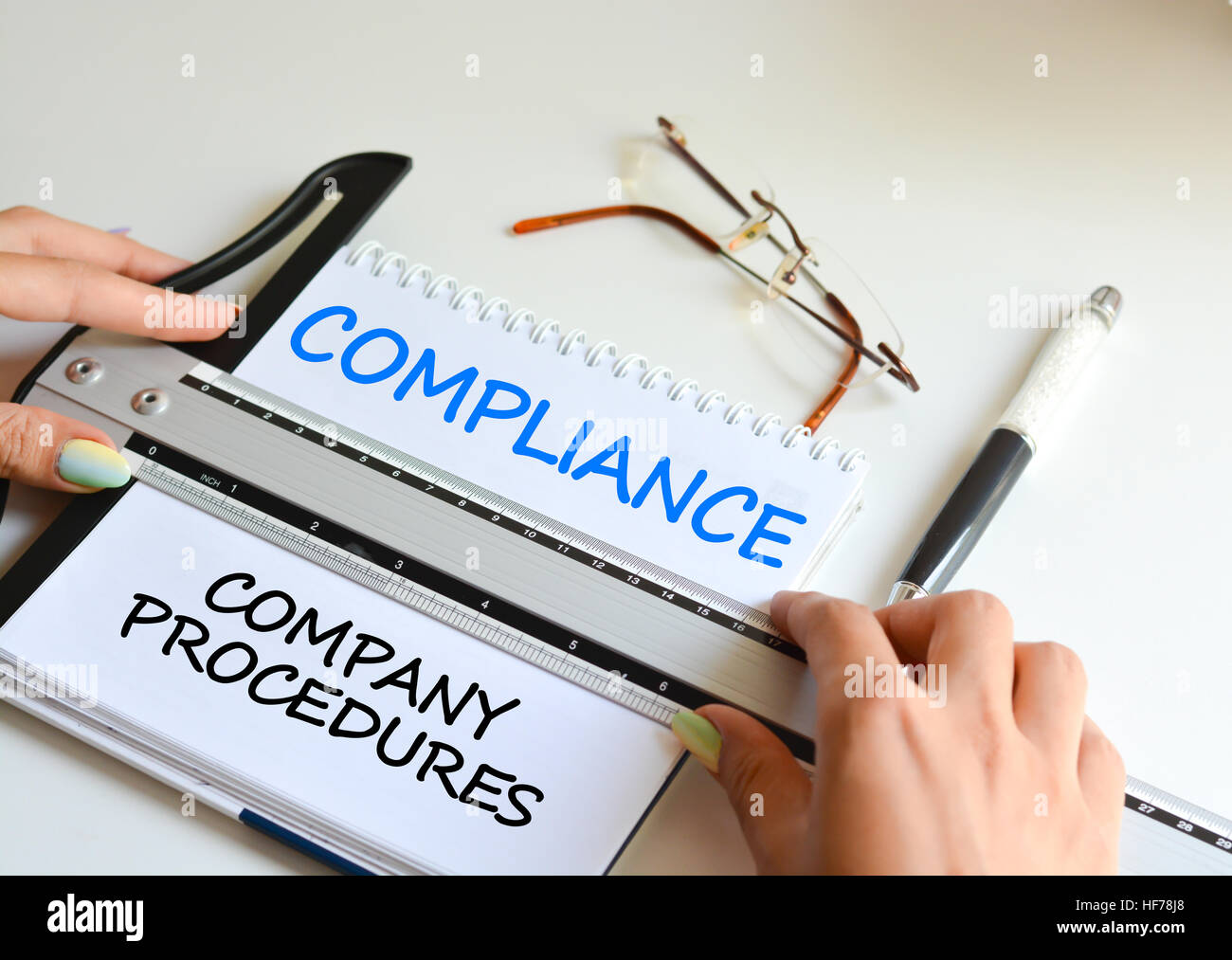 Compliance to company procedures and policies Stock Photo