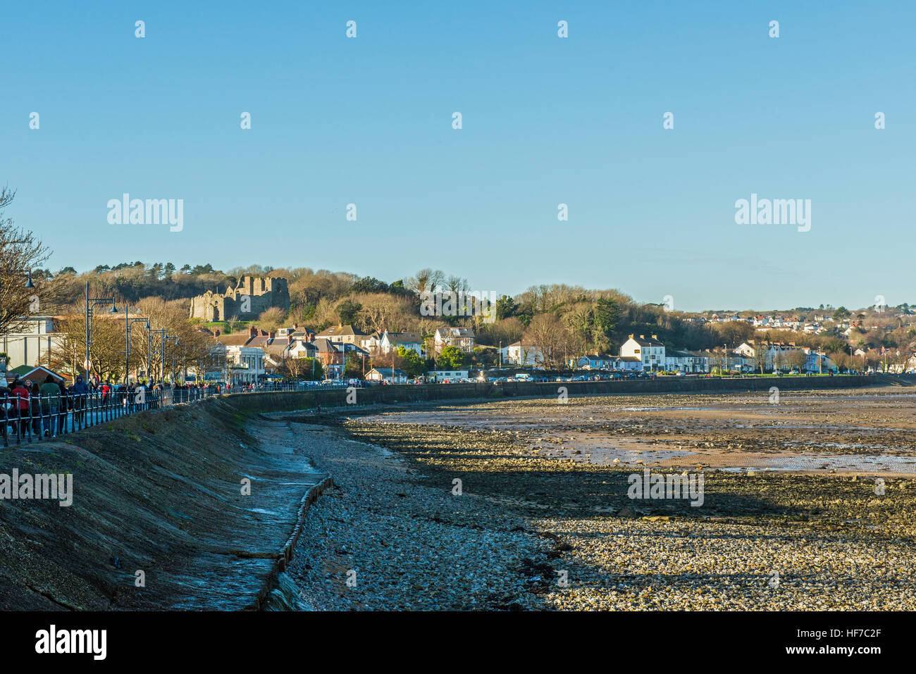 The seafront at Mumbles on the coast of Swansea Bay in south Wales, showing Oystermouth Castle Stock Photo
