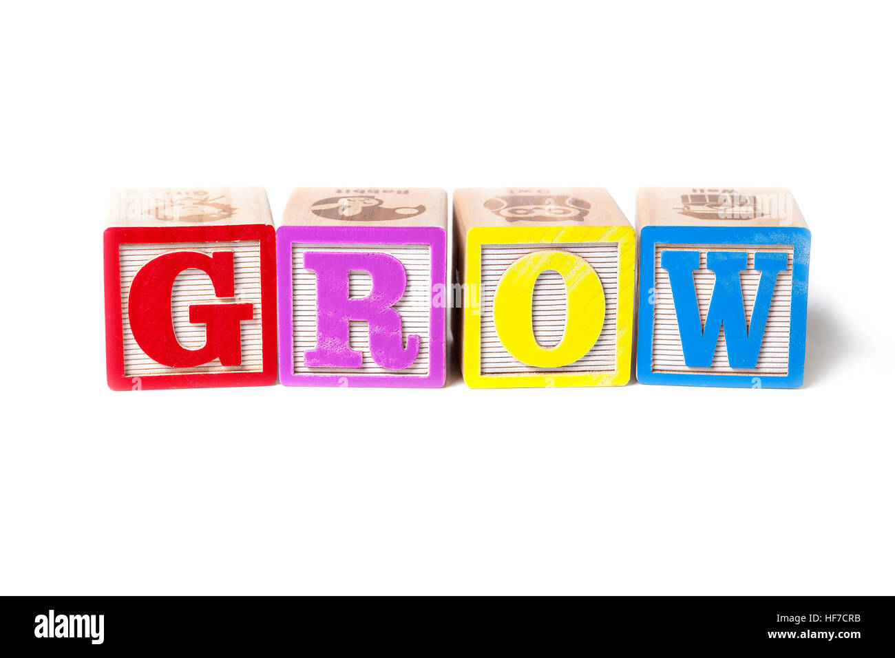 Alphabet blocks spelling the word Grow, isolated on white background