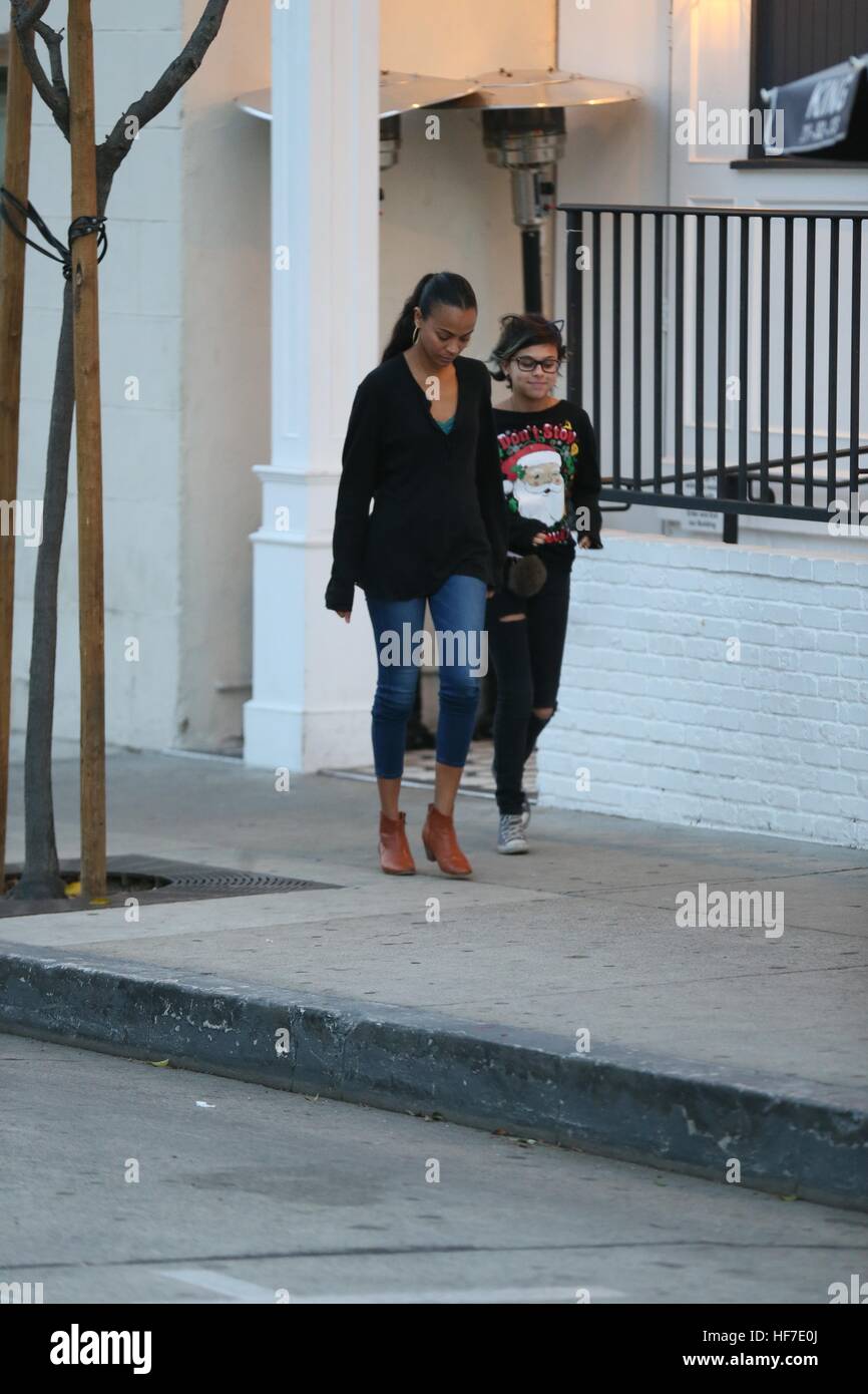 Zoe Saldana goes to Au Fudge restaurant with her husband, his parents