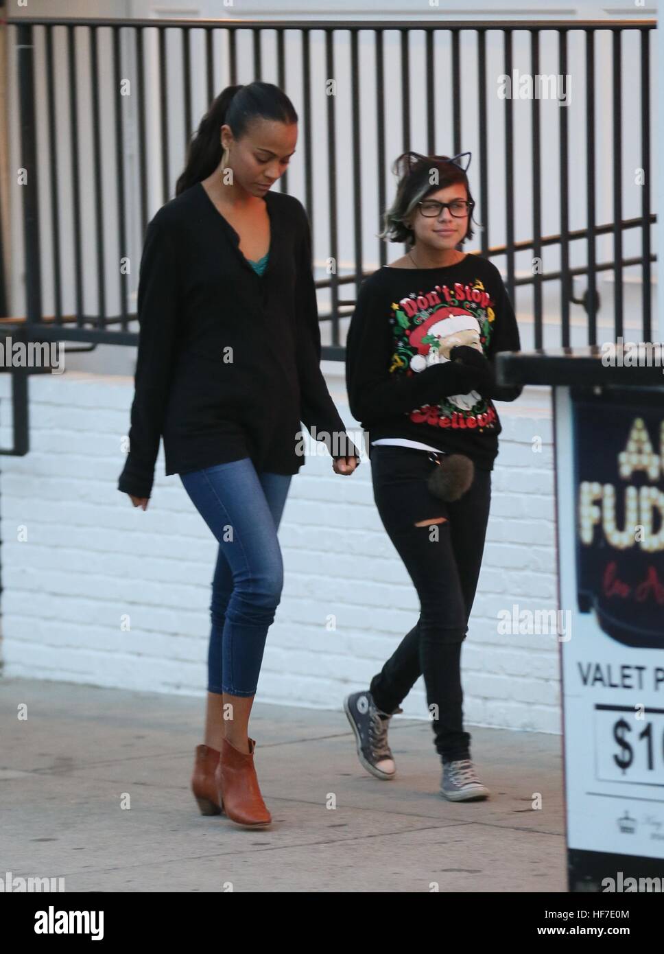 where is zoe saldana parents from zoe saldana goes to au fudge restaurant with her husband, his parents ...