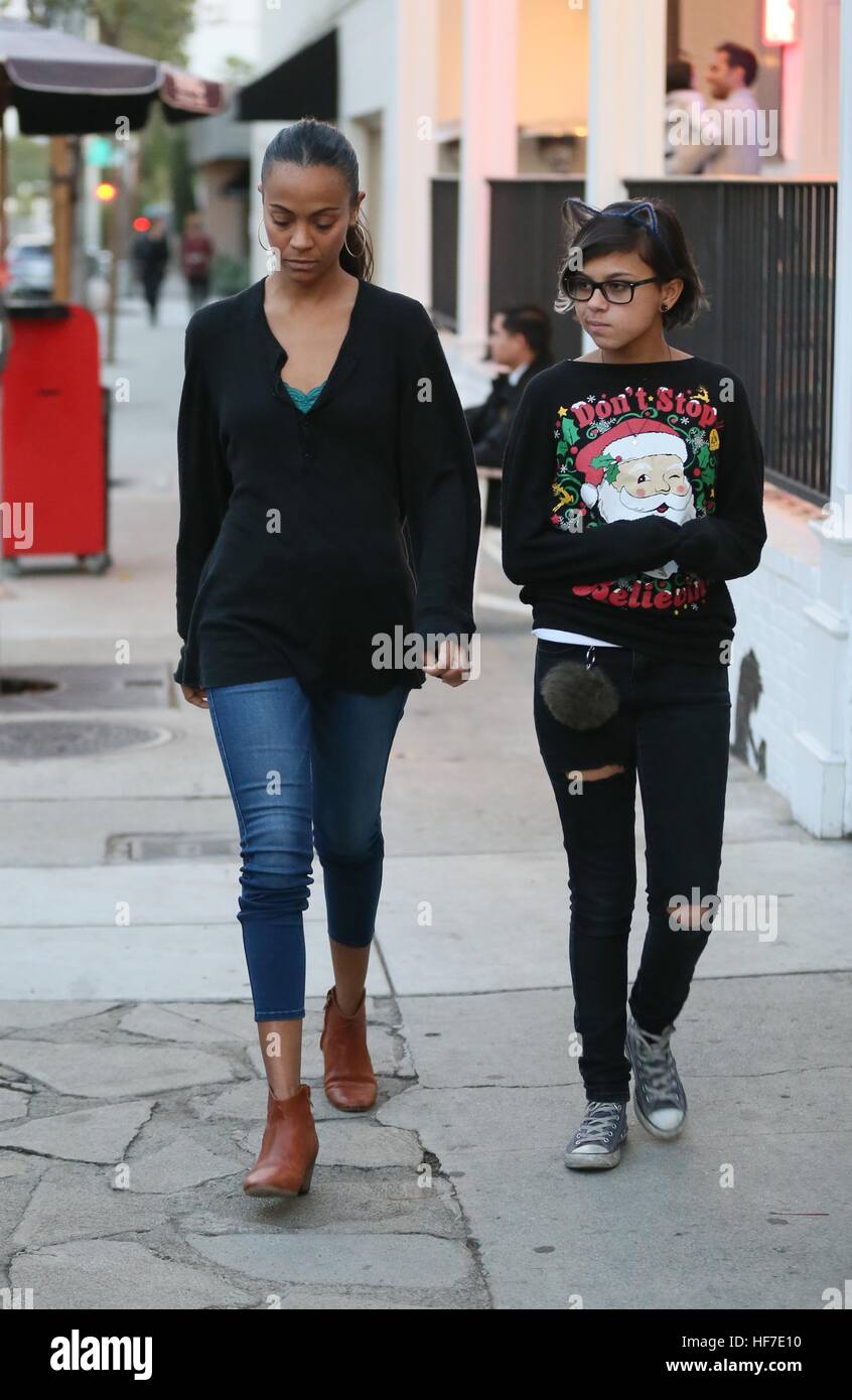 Zoe Saldana goes to Au Fudge restaurant with her husband, his parents