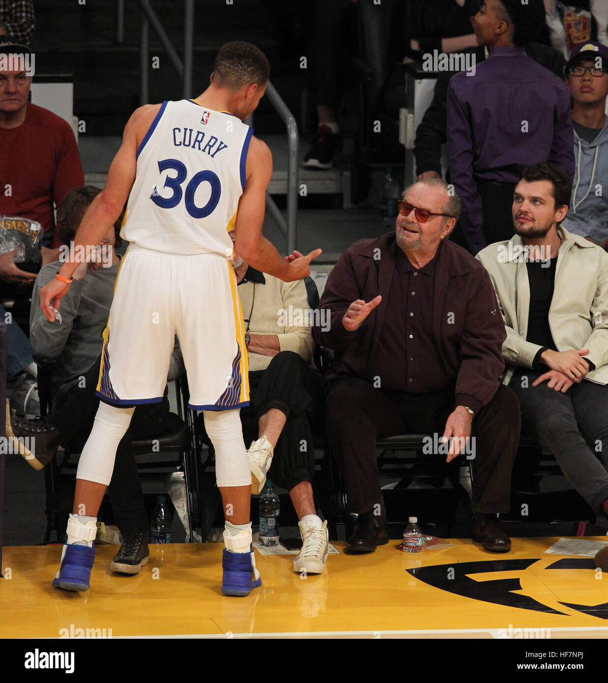 Celebrities at the Los Angeles Lakers game. The Golden State Warriors defeated the Los Angeles Lakers by the final score of 109-85 at the Staples Center in Los Angeles  Featuring: Jack Nicholson, Raymond Nicholson Where: Los Angeles, California, United St Stock Photo