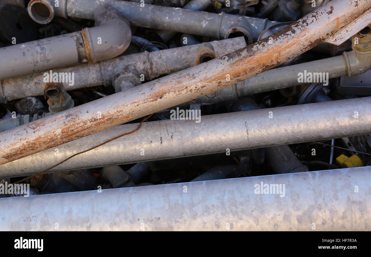 old iron pipes and other ferrous material in a landfill Stock Photo